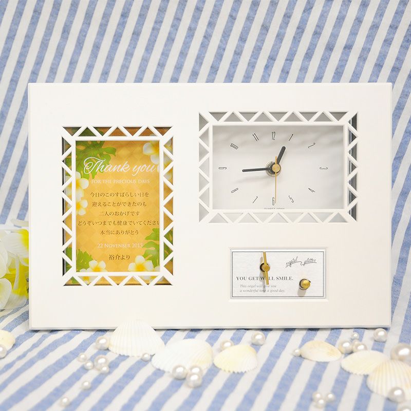 プルメリアの花をデザインした感謝状付き時計とオルゴールの両親贈呈品