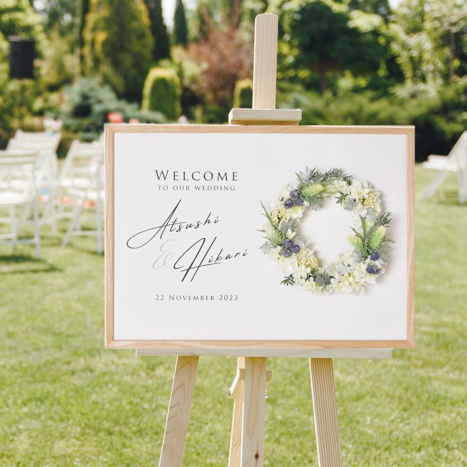 永遠の幸福を象徴するリースをナチュラル清楚にアレンジしたウェルカムボード