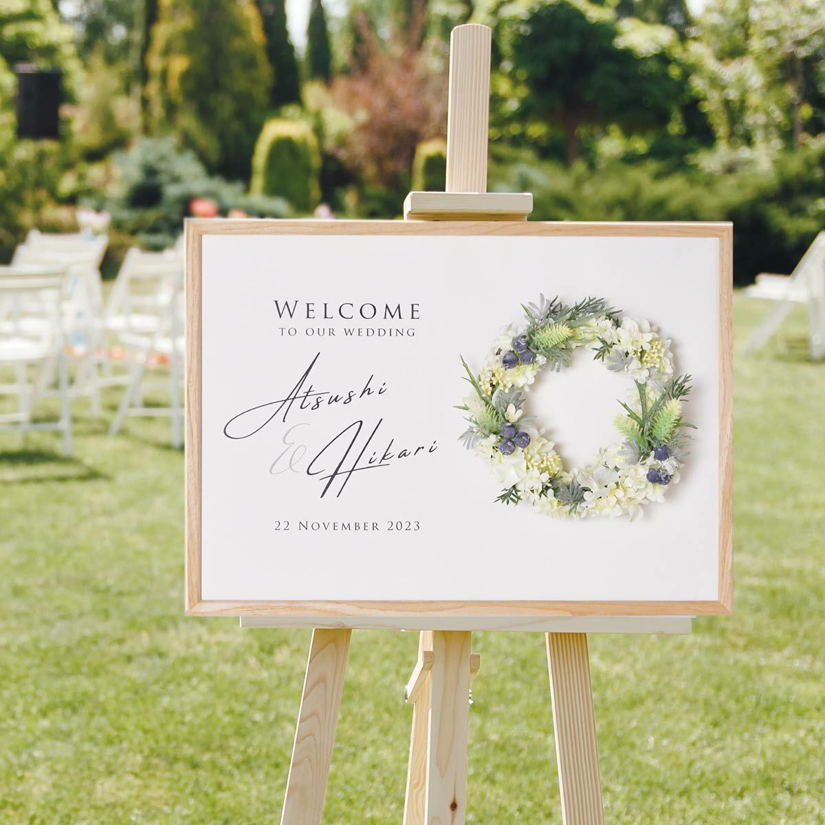 永遠の幸福を象徴するリースをナチュラル清楚にアレンジしたウェルカムボード