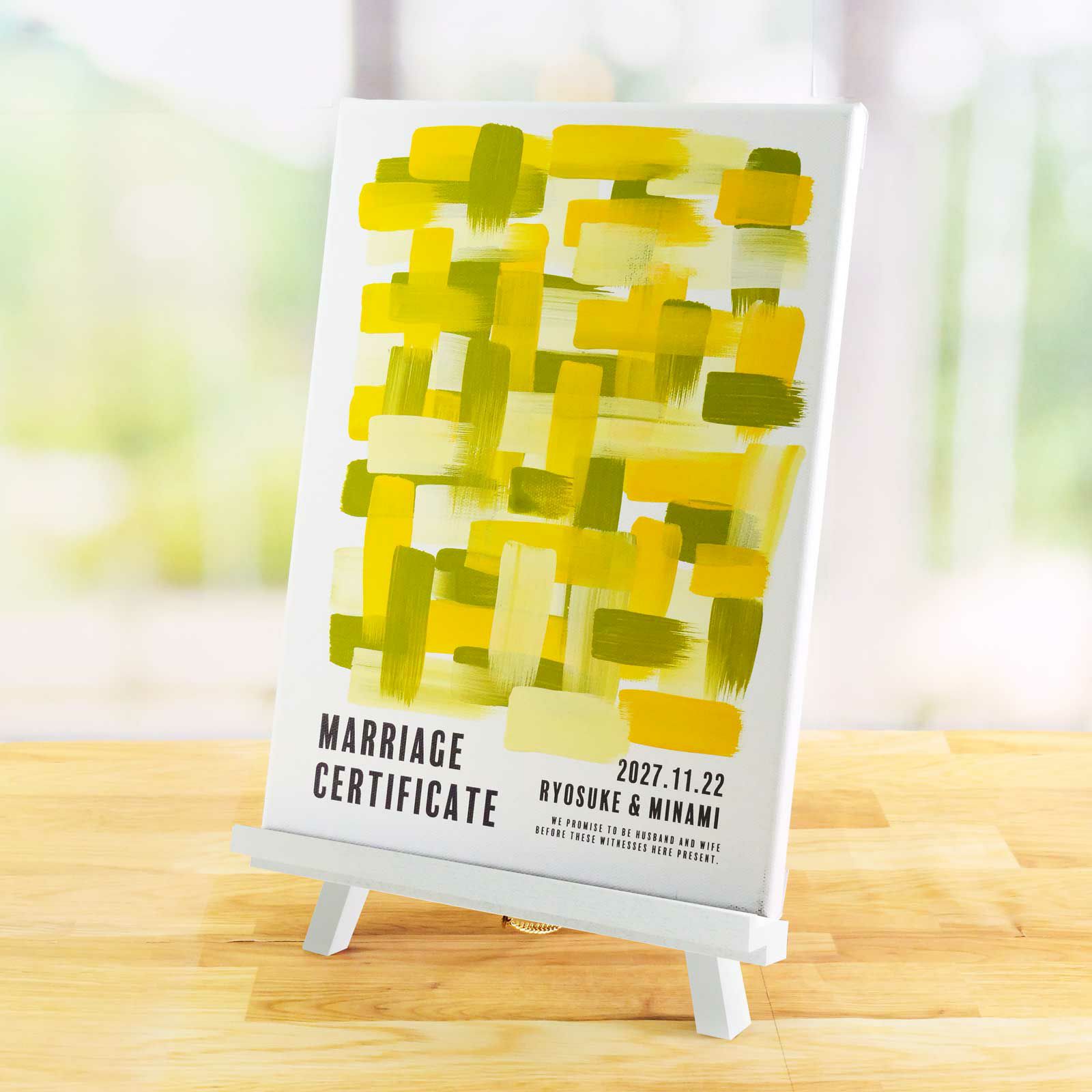 ウェディングキャンバス結婚証明書を飾っている